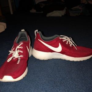 Crimson red Nike roshes